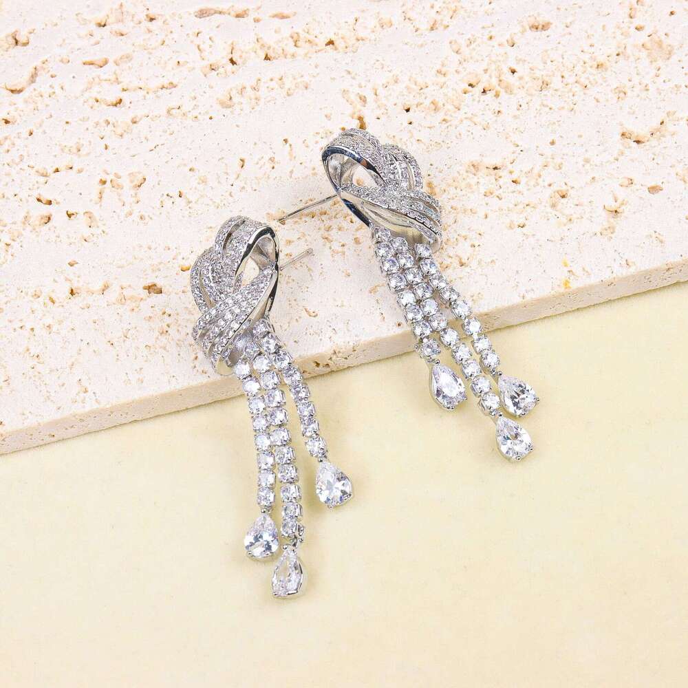 DHcollections:S Sier Needle Light Tassel Long Water Drop Fashion Bowknot Versatile Earrings Women