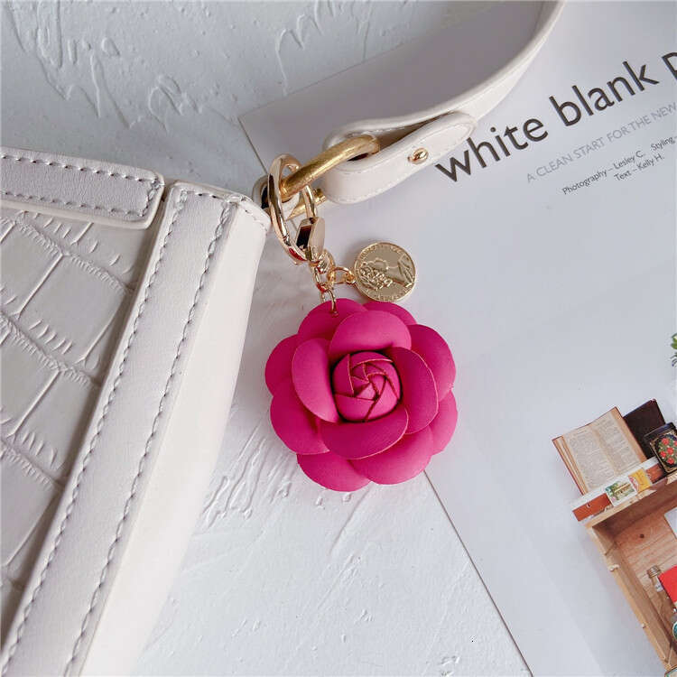DHcollections Stylish Leather Camellia Car Keychain & Backpack Hanging Accessory