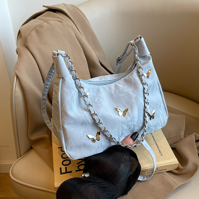 2025 autumn new French niche design fashionable versatile elegant shoulder bag cute bow fold women's crossbody bag bag designer bag