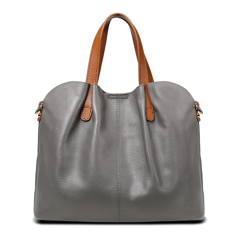 The 2025 new high-end large-capacity tote bag with contrasting colors is a versatile everyday women's bag and a niche crossbody handbag