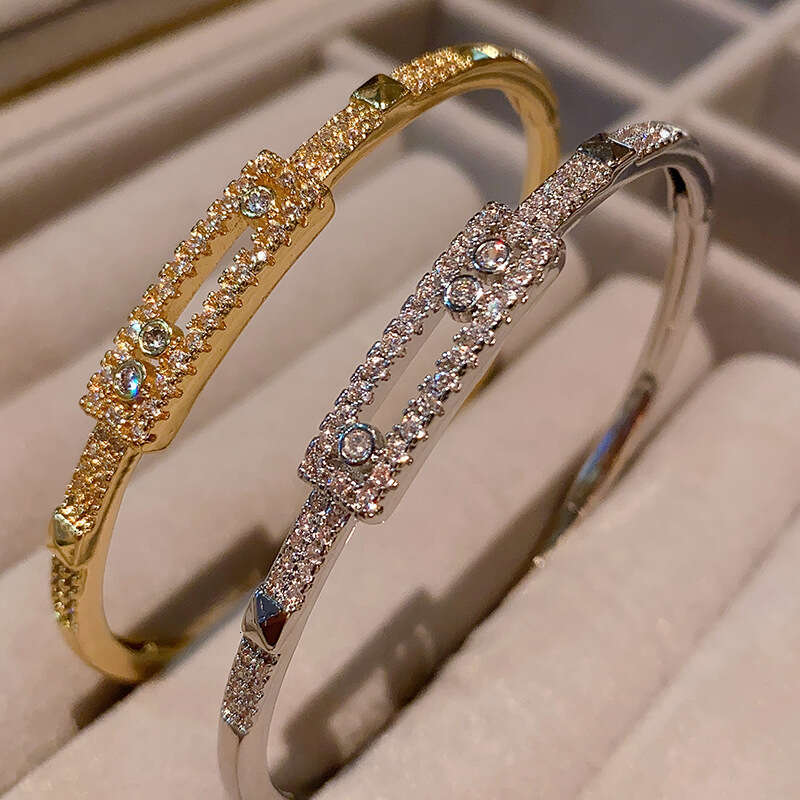 Gold Tone Luxury jewelry designer micro inlaid 5A zircon versatile three diamond sliding hollow stacked single row tennis bracelet - view 4