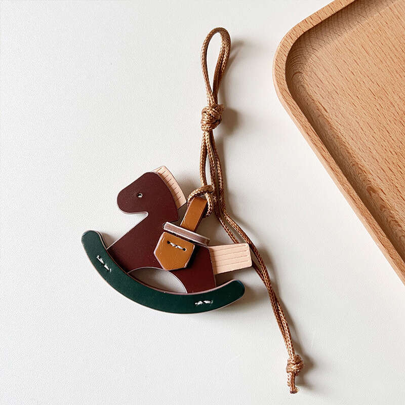 DHEssentials New Creative Rocking - horse PU Bag Hangers: Cute Decor for Bags & Cars