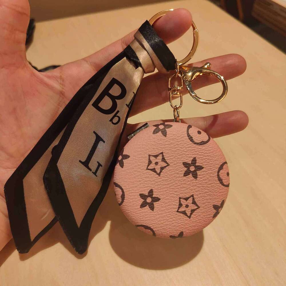 Cross-border Viral Makeup Mirror Keychain - Portable Leather Charm, Double-sided Mirror Bag Accessory