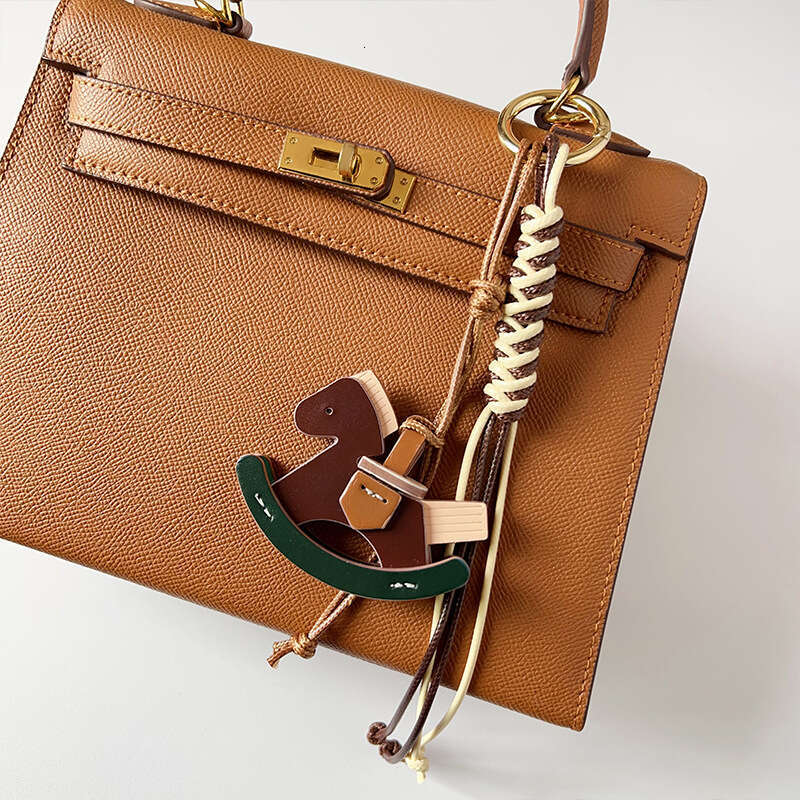 DHEssentials New Creative Rocking - horse PU Bag Hangers: Cute Decor for Bags & Cars