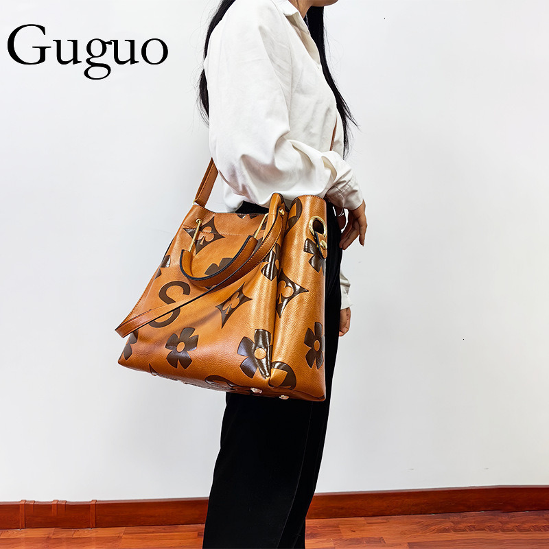 Guguo Free Shipping New Shopping Bucket For Women High-end Feel Fashionable Embossed Shoulder Office Commuter Bag Z260224
