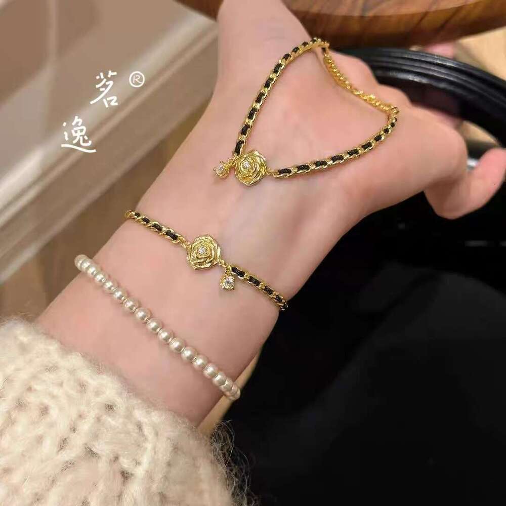 DHEssentials Nano Vacuum Coated Camellia Bracelet - Women's Luxury Black Gold Leather Cord Weave Court Style Accessory