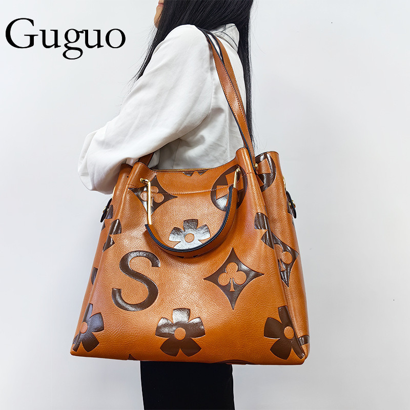 Guguo Free Shipping New Shopping Bucket For Women High-end Feel Fashionable Embossed Shoulder Office Commuter Bag Z260224