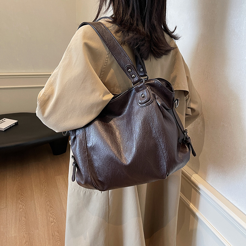 Designer bag free shipping European American retro solid color versatile shoulder bag commuting outdoor bag Fashionable