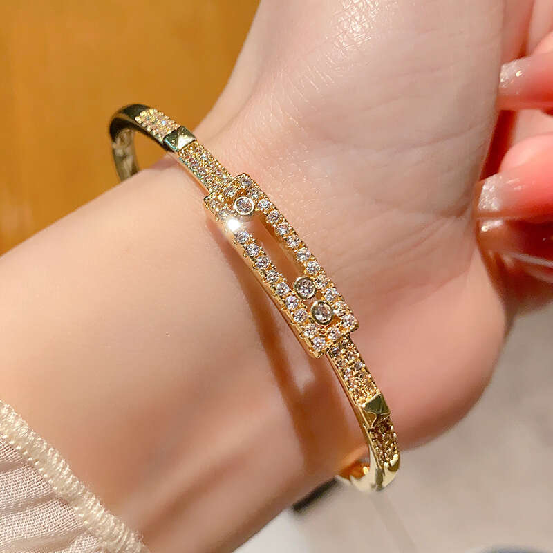 Gold Tone Luxury jewelry designer micro inlaid 5A zircon versatile three diamond sliding hollow stacked single row tennis bracelet - view 7