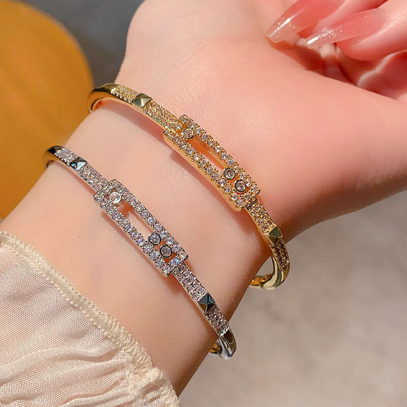 Gold Tone Luxury jewelry designer micro inlaid 5A zircon versatile three diamond sliding hollow stacked single row tennis bracelet - view 5