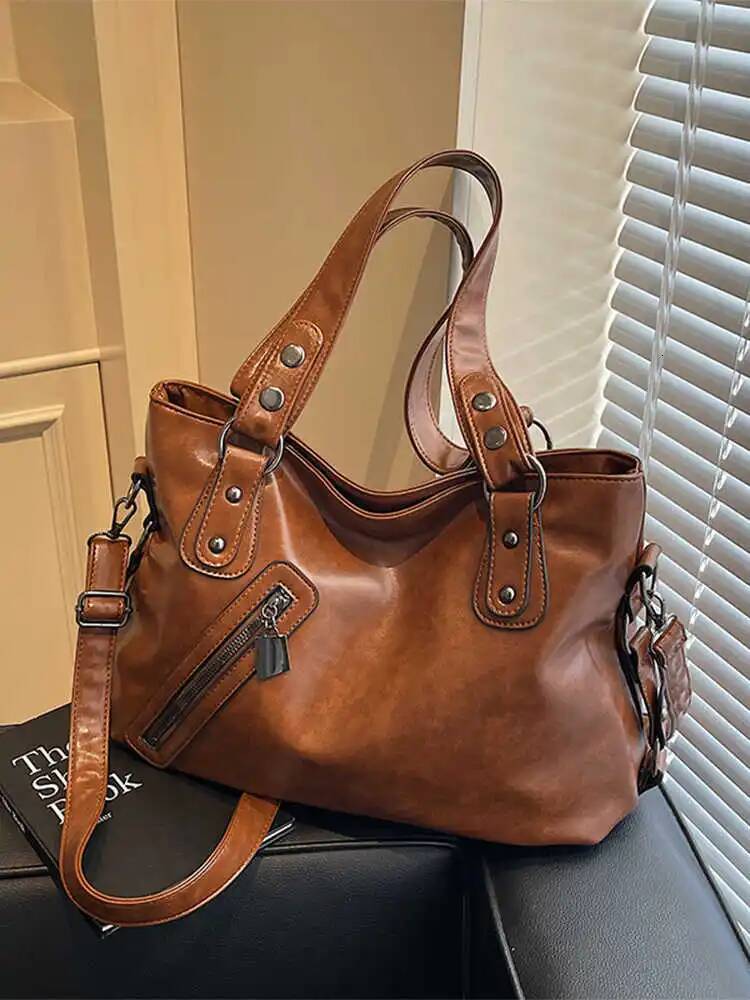 2025 new collection Fashionable retro zipper solid color women's shoulder bag, large capacity commuting women's crossbody bag, autumn new de