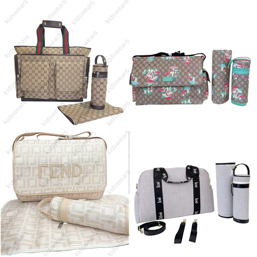 Designer style diaper waterproof mom bag 3 sets of diaper pouches baby zippers in pink black brown coffee color in various colors with checkered patterns E01
