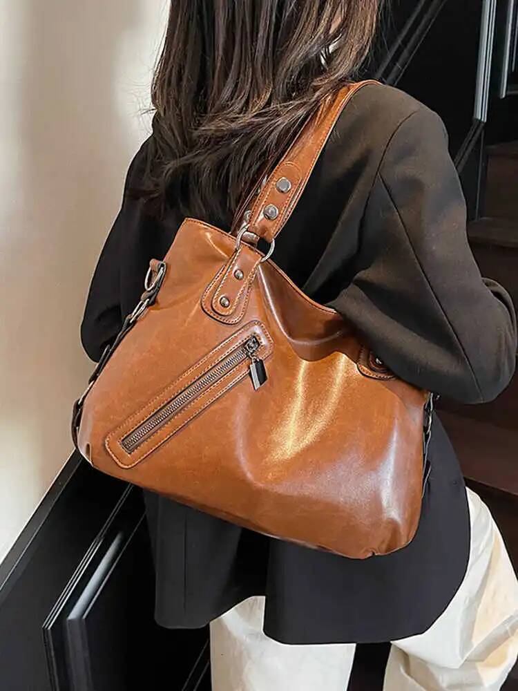 2025 new collection Fashionable retro zipper solid color women's shoulder bag, large capacity commuting women's crossbody bag, autumn new de
