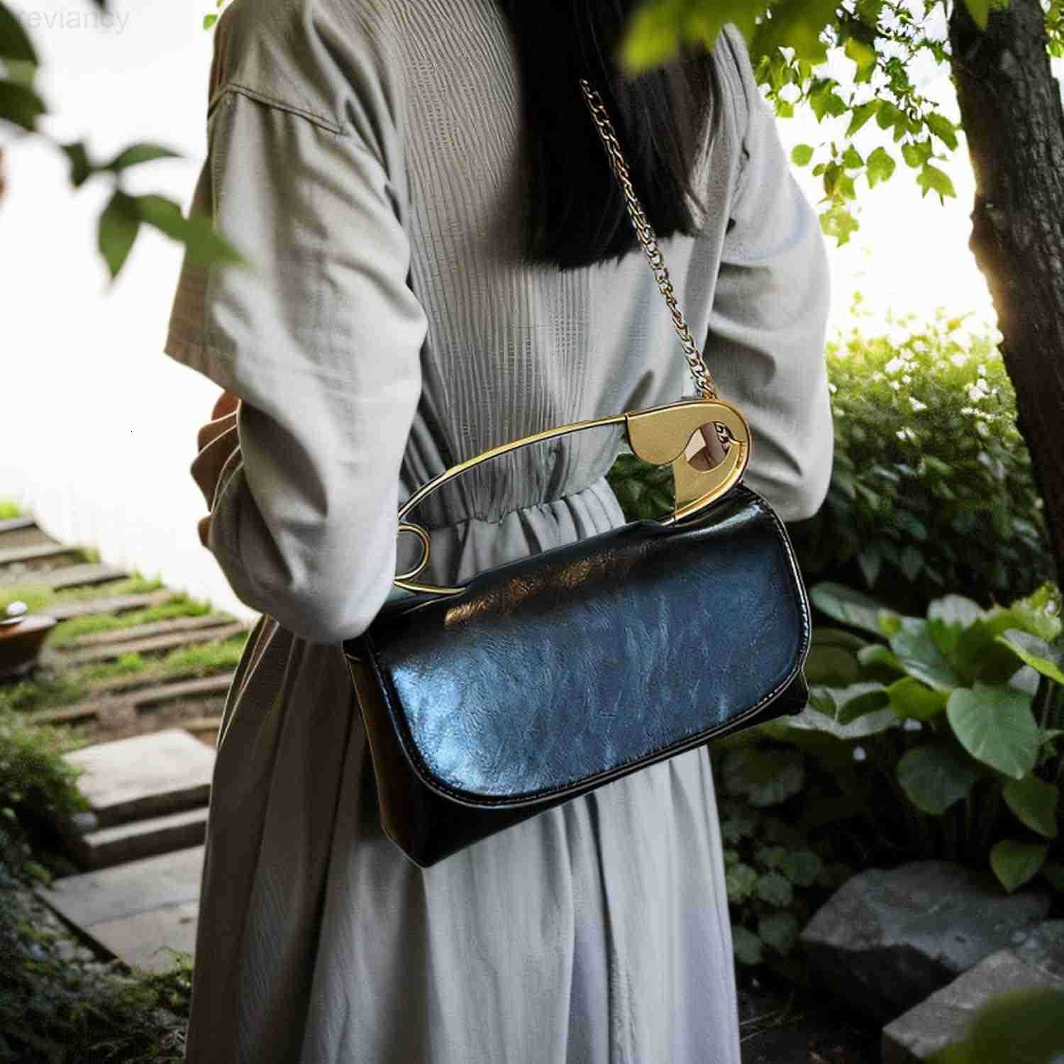 Womens Small Black Soft Pin Shaped Vegan Leather Crossbody Purse Bag with Gold Metallic Handles ChainW250908