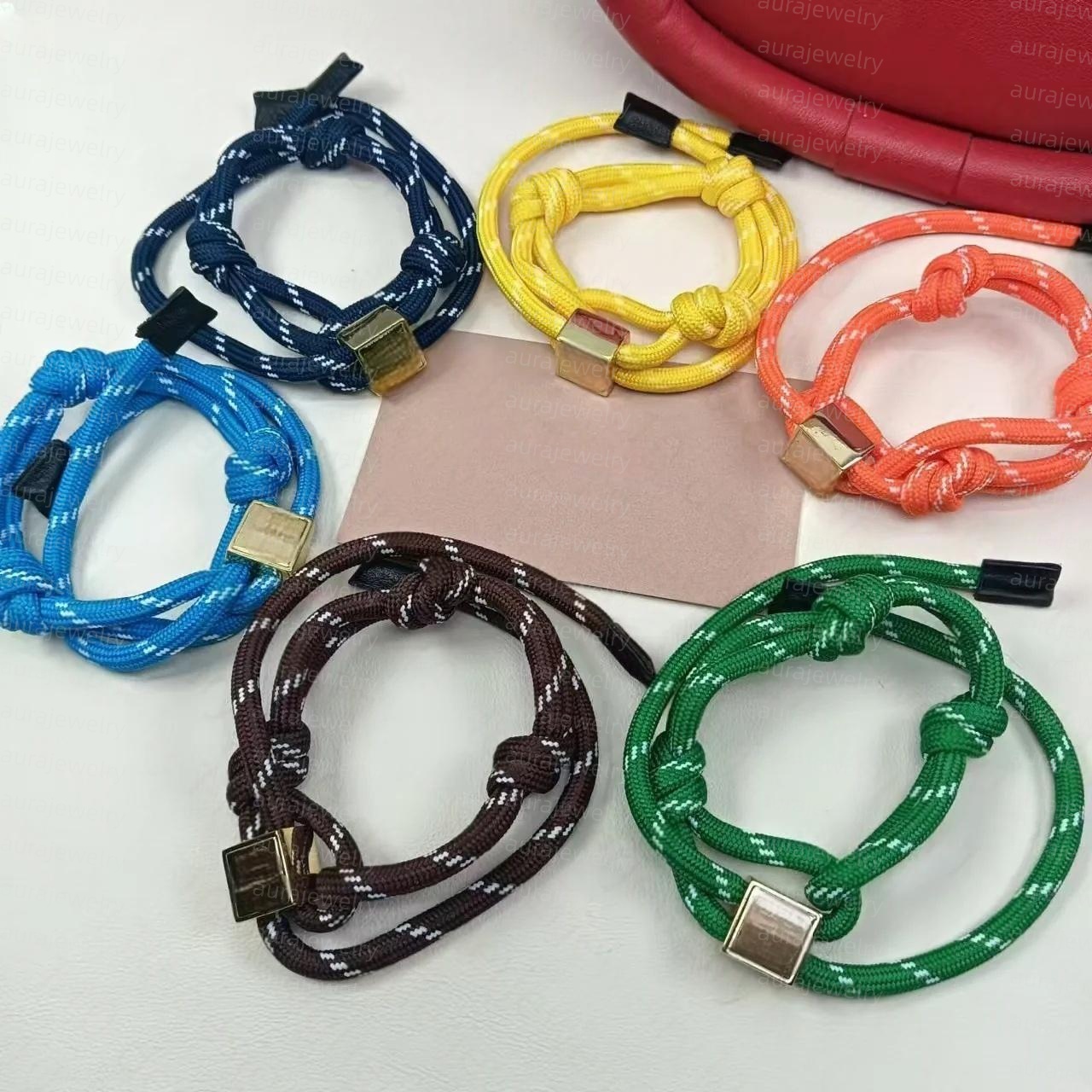 Designer bracelets handcuffs with colorful rope design stainless steel metal button bracelets adjustable hand chains jewelry for men and women couple gifts Casual