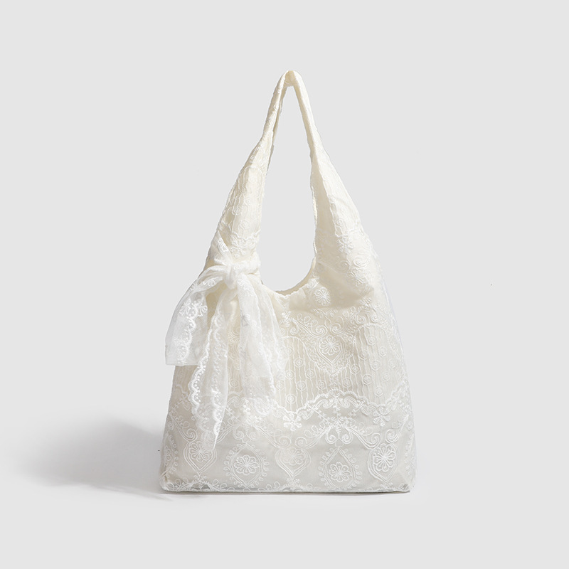 Lace canvas bag new fashion large capacity versatile commuting bag autumn new designer bag design minimalist women's shoulder bag