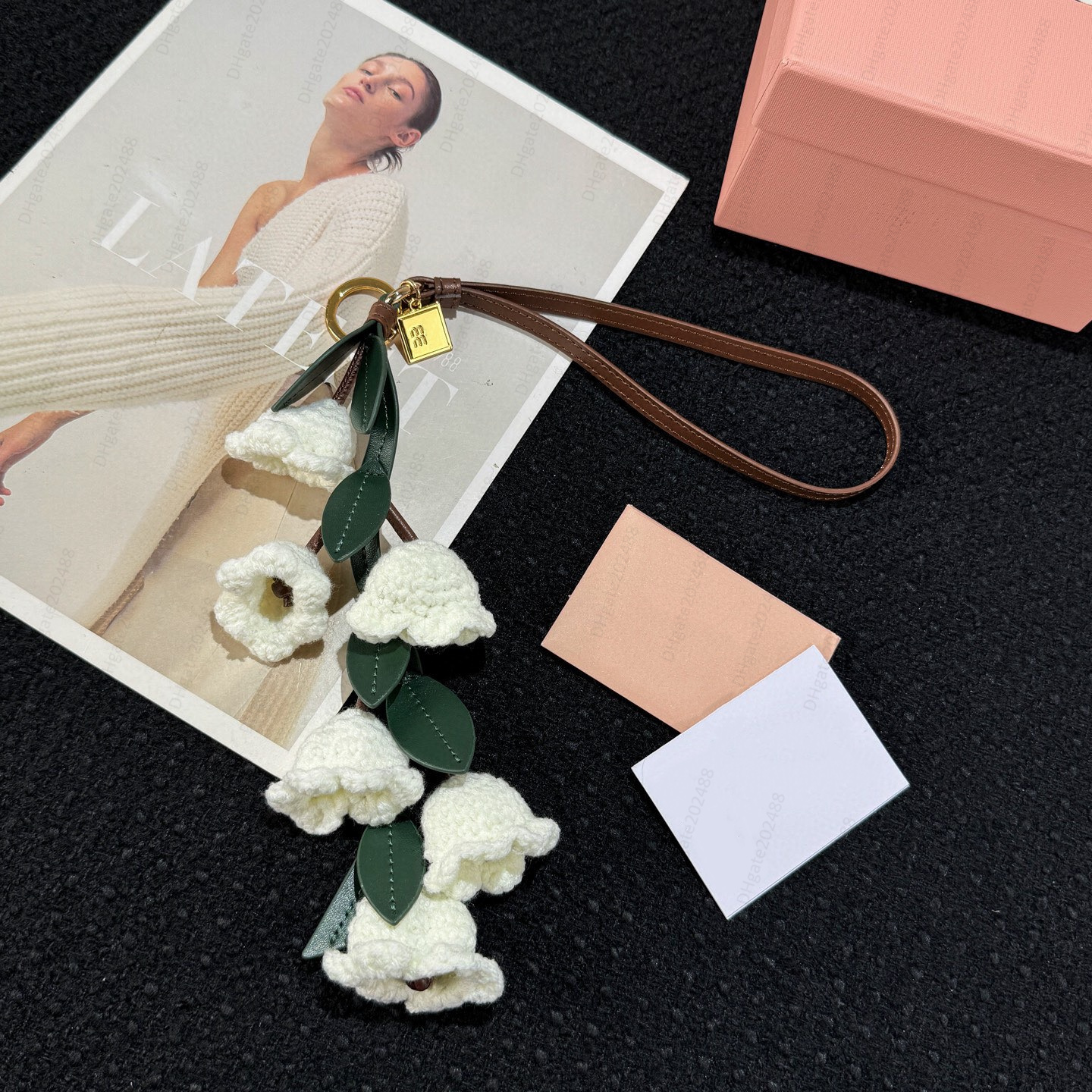 Designers keychains mu Trick Lily of the valley Weaving leather keyring Letters bag charm Strawberry Car Phone chain Women jewelry Keyring Bags Pendant Exquisite