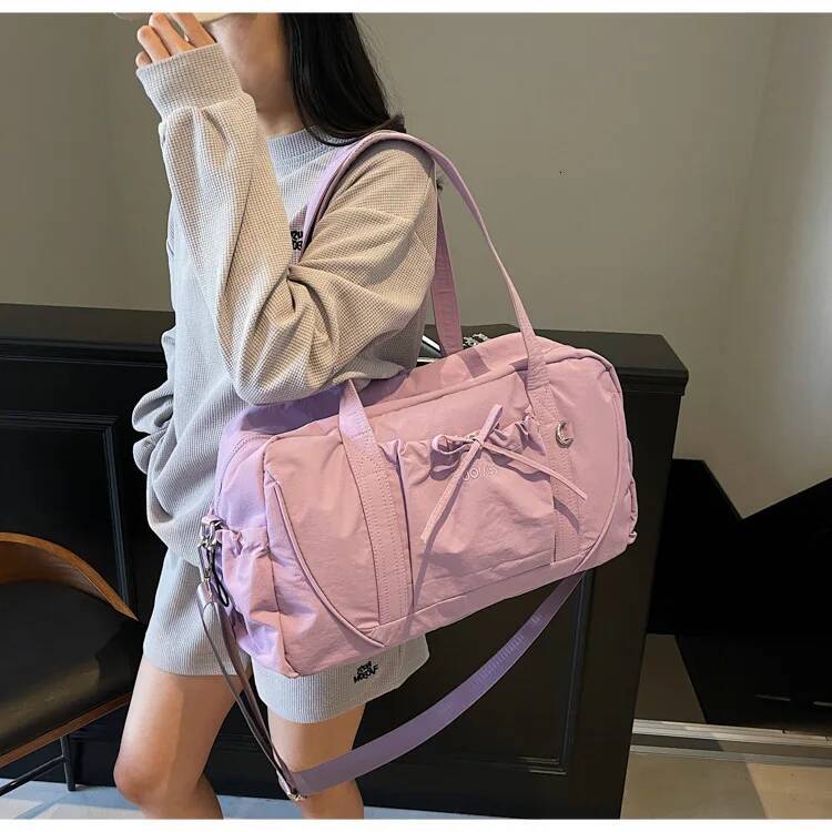 New Travel Bag Large Capacity Portable Luggage Travel Bag Boarding Bag Sports Autumn New Designer Bag Fitness Bag design Women's Shoulder Bag