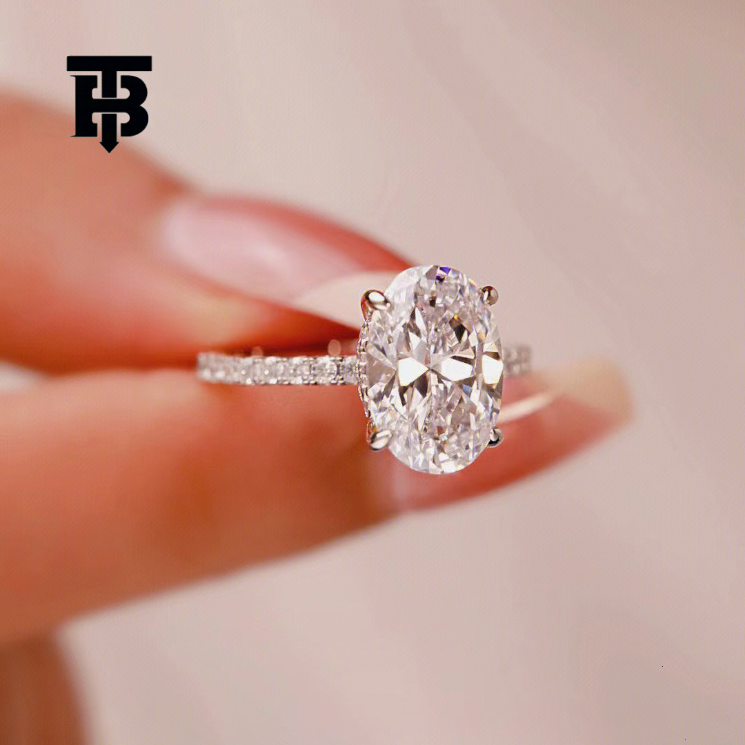 TB BHULAMTE Free Shipping New Designer Accessories Luxury Four Fork Imitation Moissanite Diamond Ring Large Oval Pigeon Egg Ring For Women