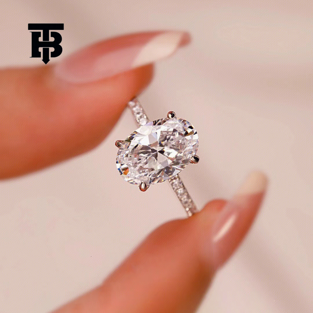 TB BHULAMTE Free Shipping New Designer Accessories Luxury Four Fork Imitation Moissanite Diamond Ring Large Oval Pigeon Egg Ring For Women