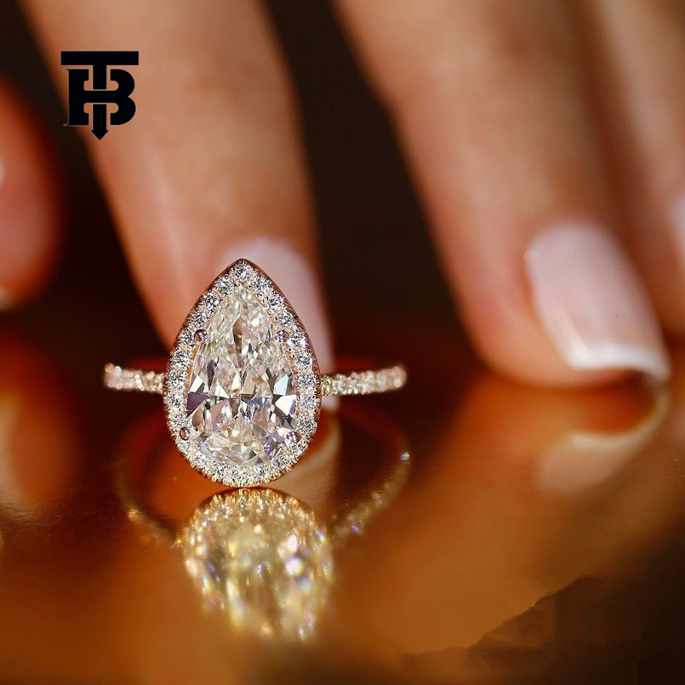 TB BHULAMTE Free Shipping New Designer Accessories Copper Micro Inlay Cross Border Jewelry Creative Sparkling Water Drop Zircon Wedding Ring Women