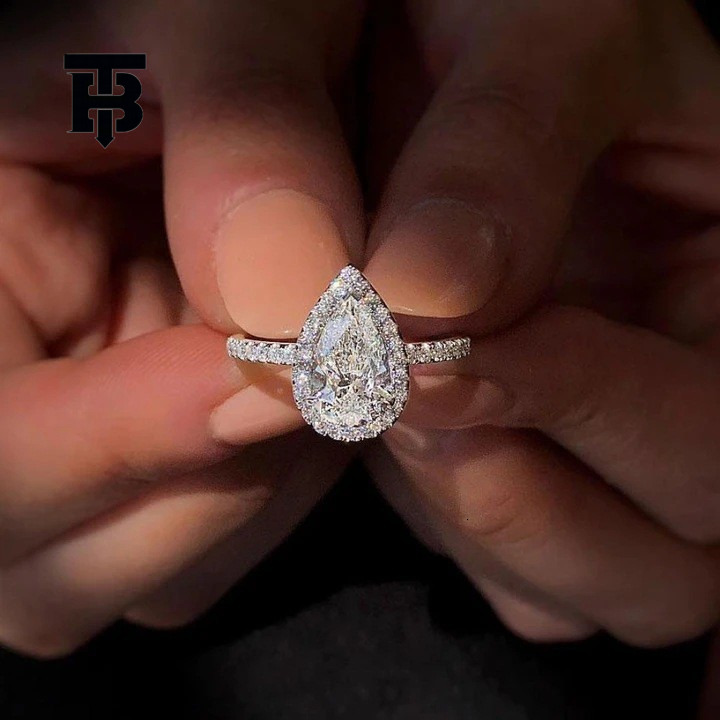 TB BHULAMTE Free Shipping New Designer Accessories Copper Micro Inlay Cross Border Jewelry Creative Sparkling Water Drop Zircon Wedding Ring Women