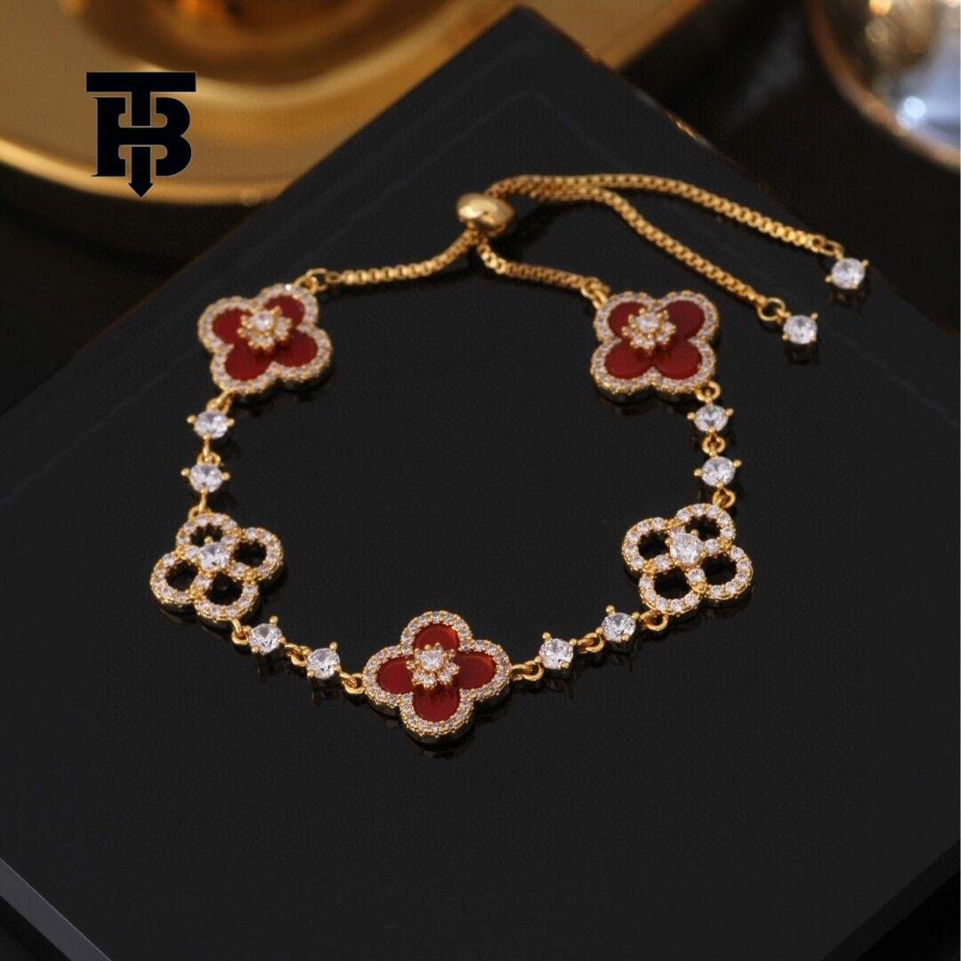 TB BHULAMTE Free Shipping New Designer Accessory Exquisite Diamond Inlay Shiny Imitation Natural Powder Shell Hollow Lucky Clover Pull Bracelet