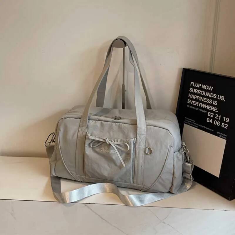 New Travel Bag Large Capacity Portable Luggage Travel Bag Boarding Bag Sports Autumn New Designer Bag Fitness Bag design Women's Shoulder Bag