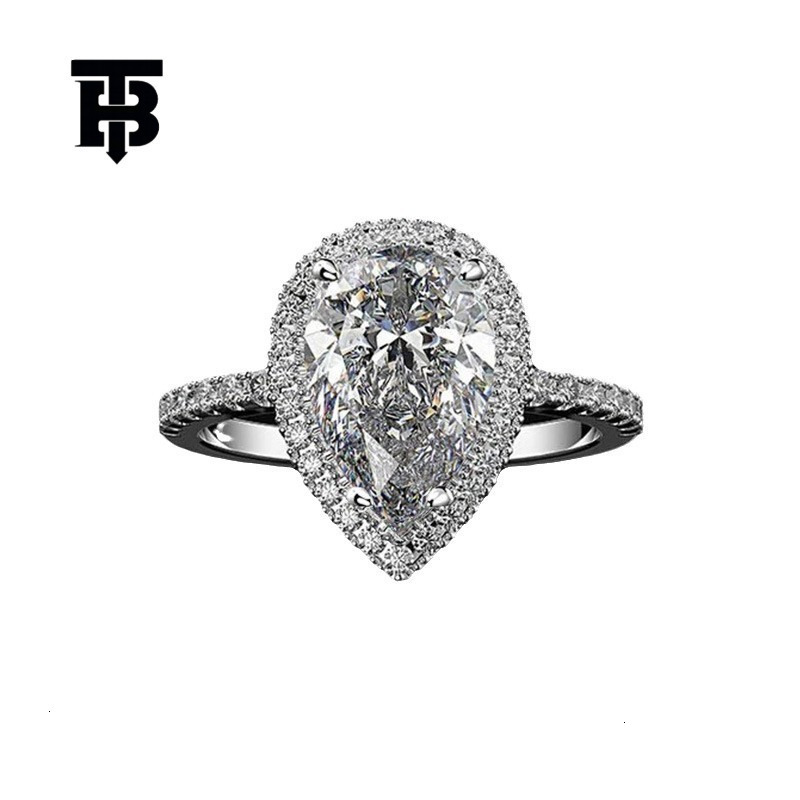 TB BHULAMTE Free Shipping New Designer Accessories Copper Micro Inlay Cross Border Jewelry Creative Sparkling Water Drop Zircon Wedding Ring Women