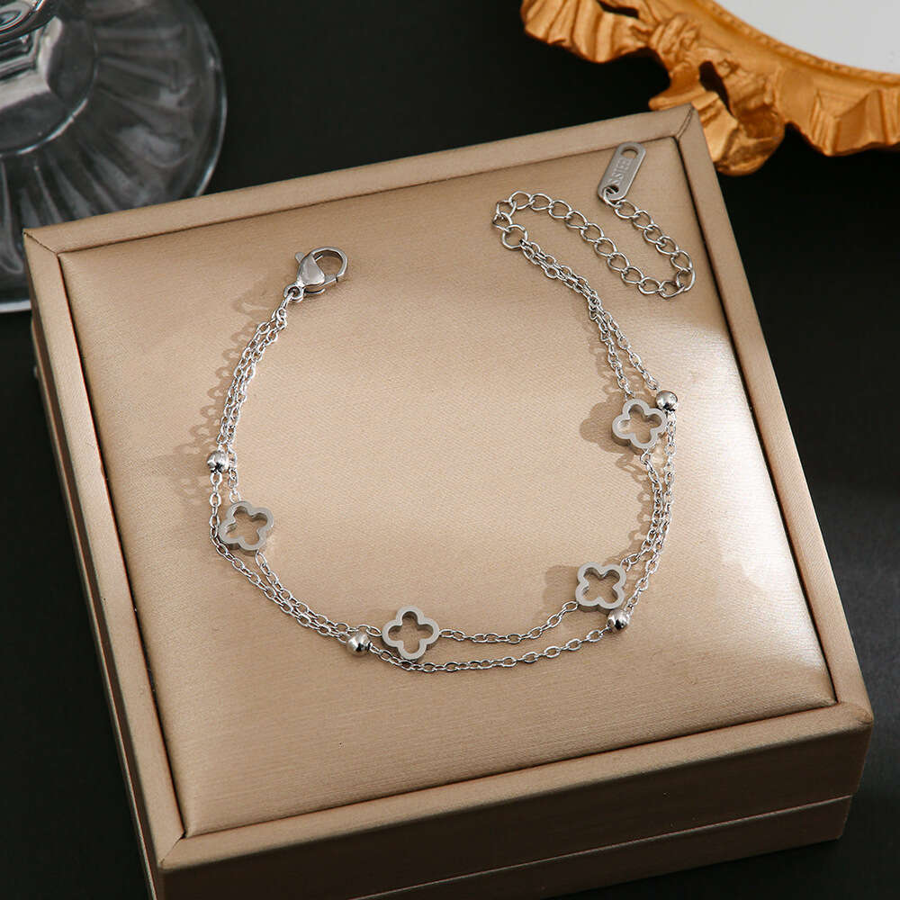 Japanese and Korean Light Fashion Hollow Four-Leaf Clover Titanium Steel Bracelet for Women Simple Versatile Layered Best Friend Jewelry Non-Fading