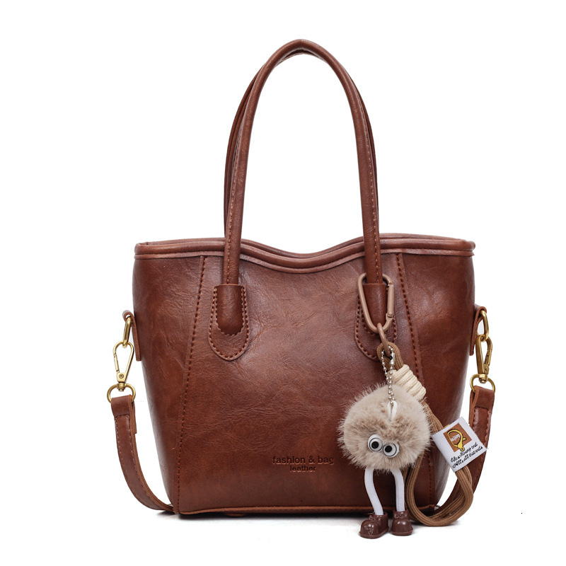 Free shipping designer Large Capacity Commuter Bag Handbag Women Fashion Bucket Bag New Single Shoulder Bag Simple Texture Casual Tote Bag