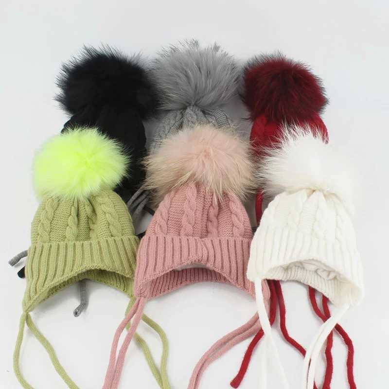 Real Fur Pompom Baby Hat Kids Winter Earfl C Fleece Inside Warm Knitted Skullies Beanies For Girls BoysXJ250910