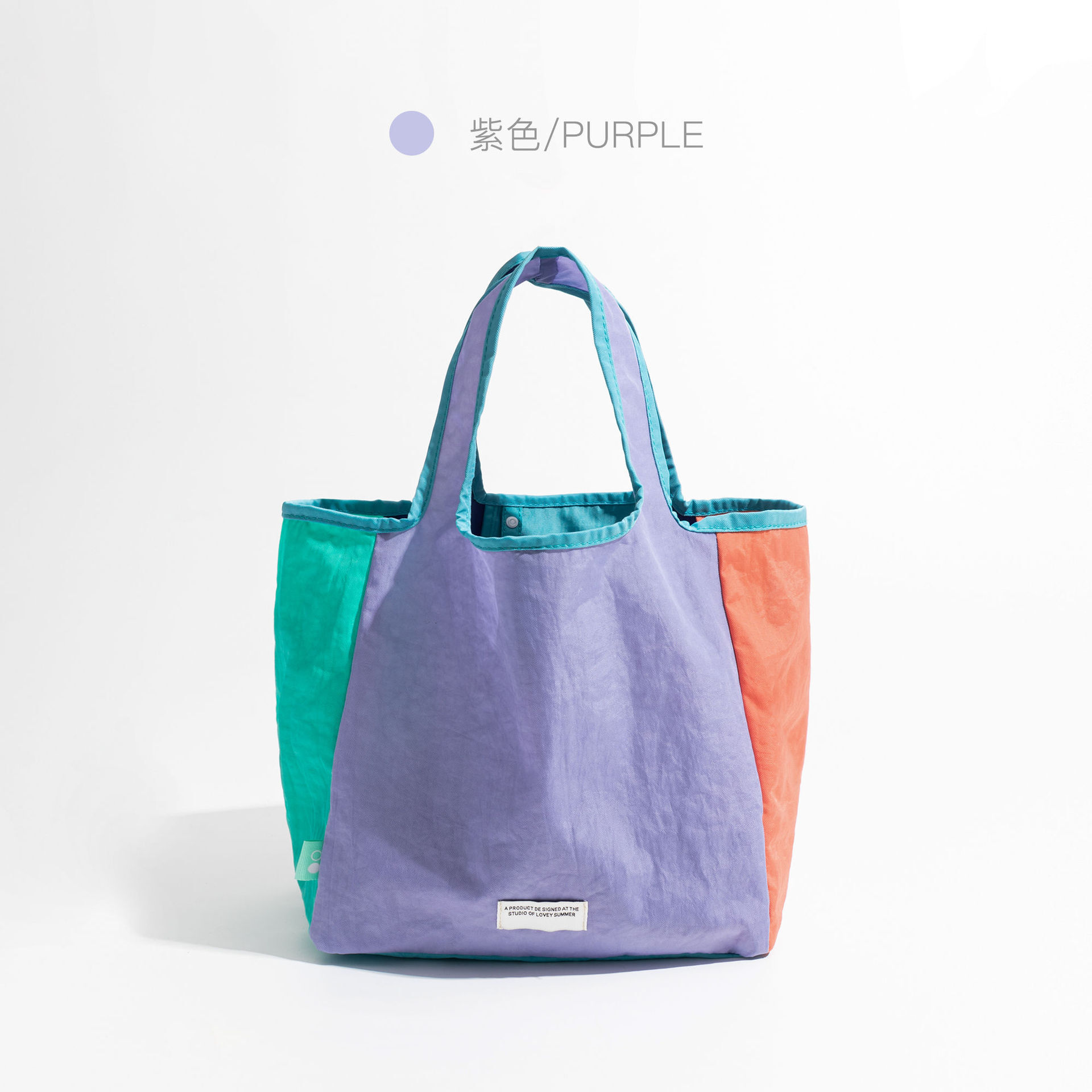 2025 designer's new color blocked foldable shoulder bag