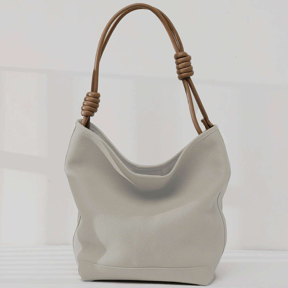 Designer Top Layer Cowhide Bucket For Women New Tote Bag With Braided Rope Soft Genuine Leather Lazy Style Underarm Bag Handbag