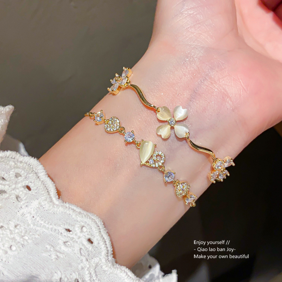 Gold-Tone Bracelet With Mother-of-Pearl Flower (And Pearl Accent) & Crystal Flower Accents, Delicate Feminine Style, Perfect For Elevating Daily Elega