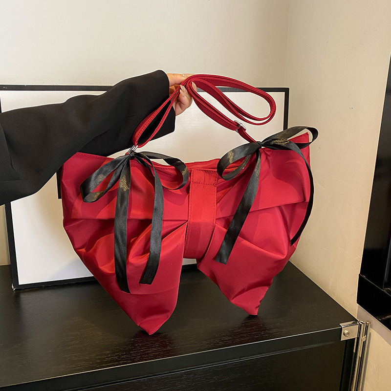 2025 Autumn New Cute Bow Sweet Style Light bag Luxury Versatile Trendy Fashion Niche Design Women's Shoulder Bag Designer Bag