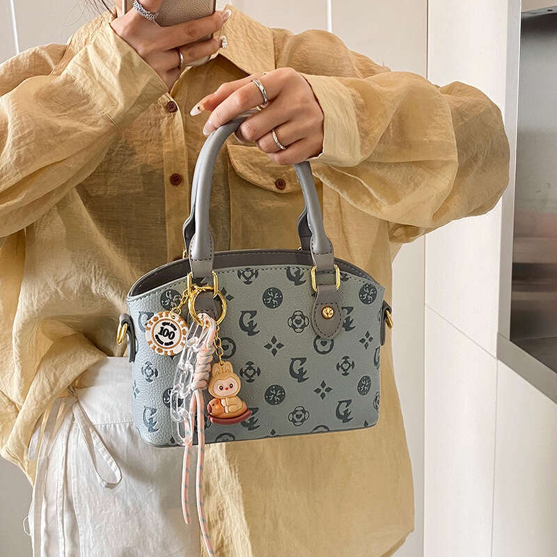 2025 New Women's Single Shoulder Crossbody Niche Cute Light Luxury Texture Shell Bag Fashion Versatile Handbag