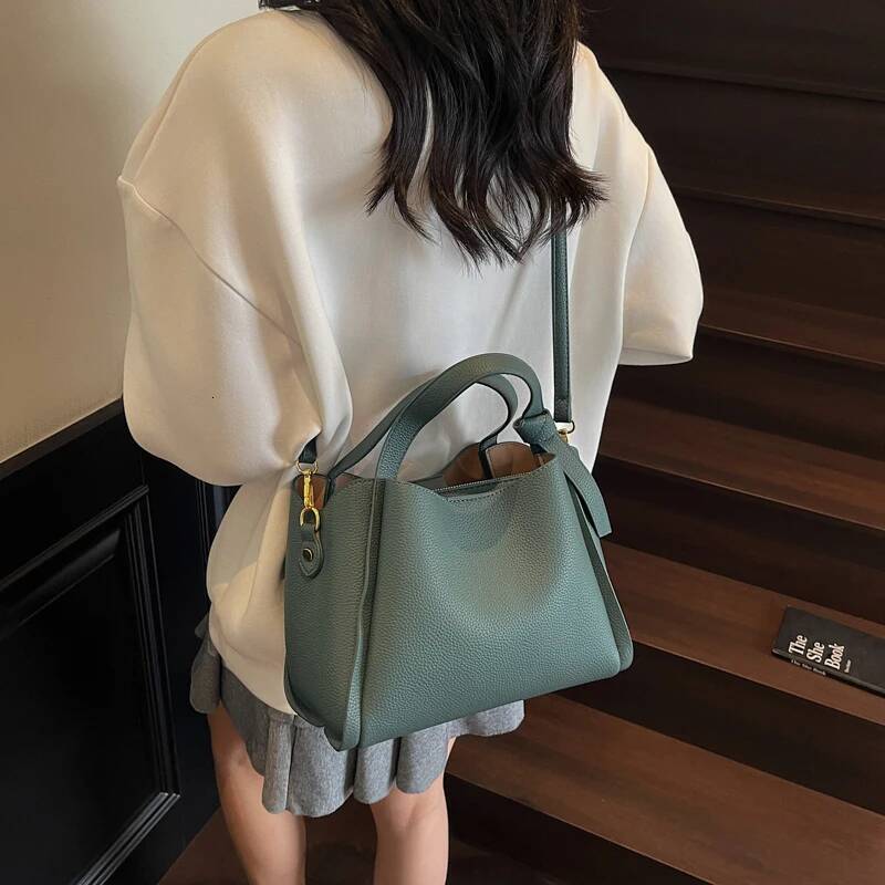 PU leather bucket bag women s shoulder bag short handle solid color simple style autumn new item lychee pattern designer bag women s crossbody bag tra