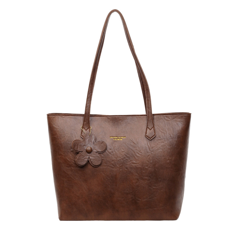 Free shipping designer Fashion Retro Style Tote Bag for Women New Versatile Commuter Bag High-End Large Capacity Shoulder Bag Underarm Bag