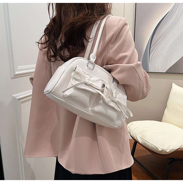 Summer New Women S Luxury Bag Bag Designer Bag Korean Style Bowknot Underarm Free Shipping Bag Niche Ballet Style Large Capacity Bowling Ball Shoulder
