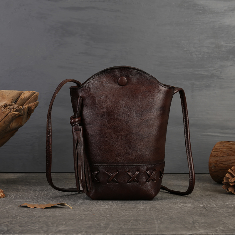 2025 new designer cowhide woven mobile phone bag mini sloping shoulder casual tassel handbag