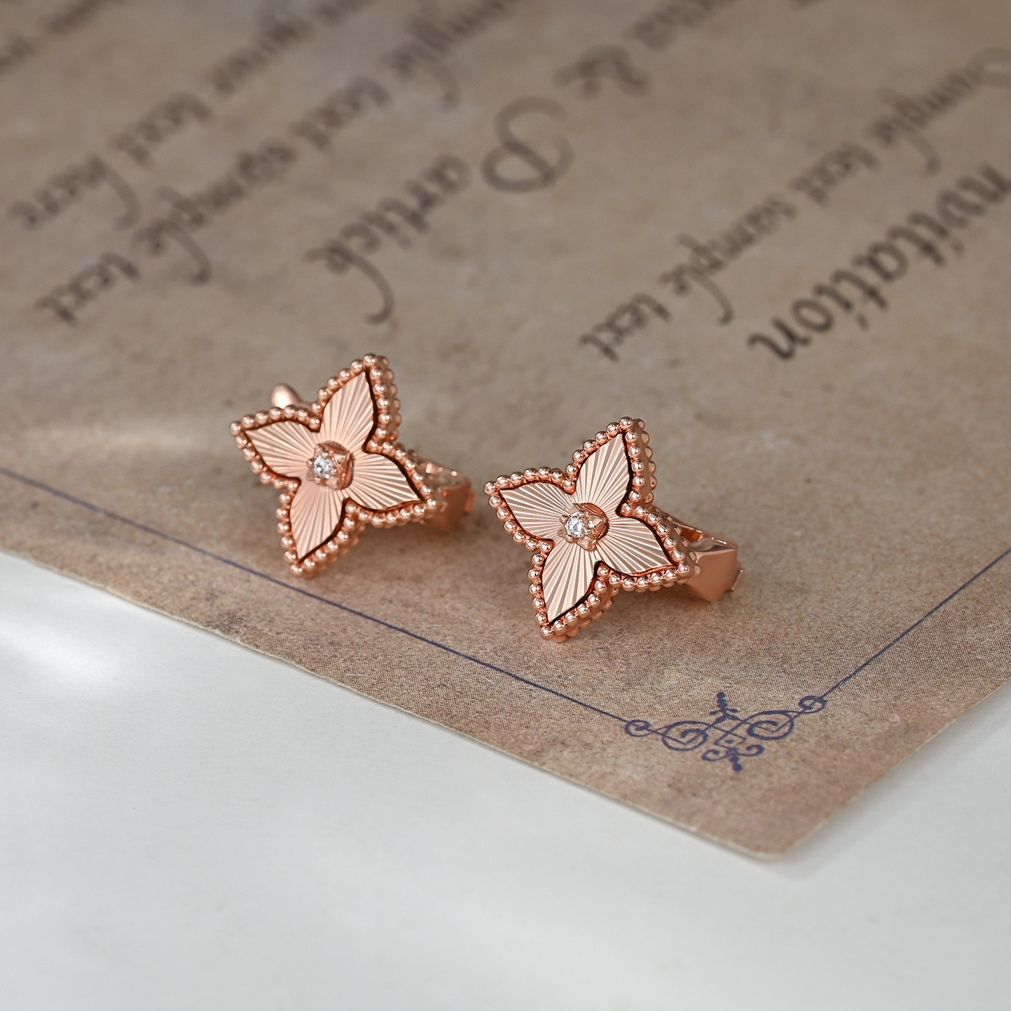 Rose gold genuine gold electroplated light luxury ear buckle temperament versatile classic old flower clover earrings for women