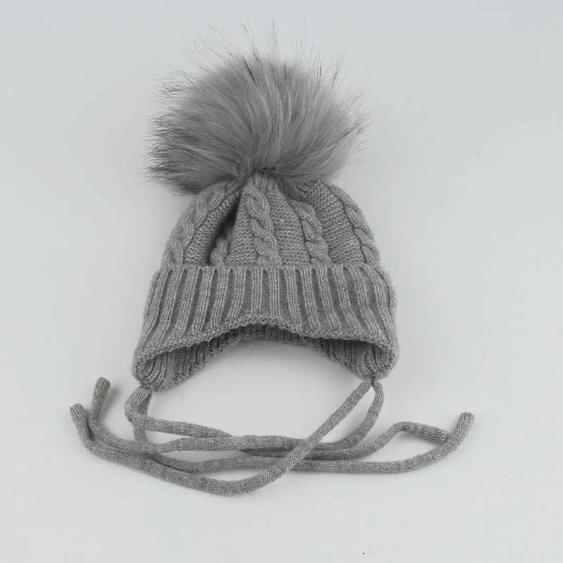 Real Fur Pompom Baby Hat Kids Winter Earfl C Fleece Inside Warm Knitted Skullies Beanies For Girls BoysXJ250910