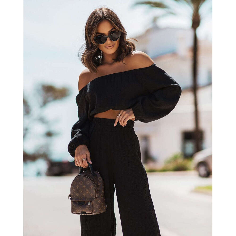2024 European and American new short-sleeved off-shoulder top straight-leg pants solid color commuting two-piece set