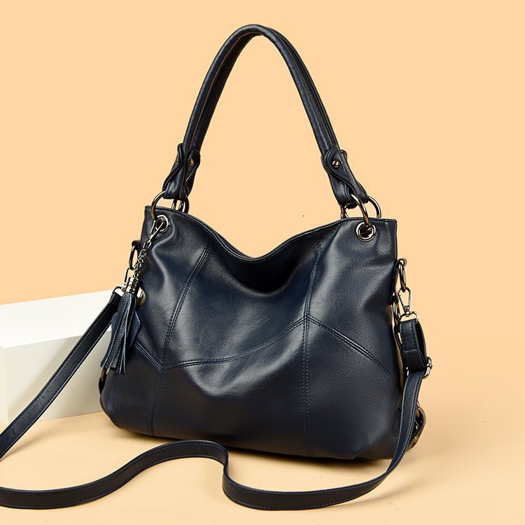 Free shipping designer New Large Polyester Retro Bag Fashion Patchwork PU Tassel Handbag Shoulder Bag Tote Bag Crossbody Bag Commuter Bag Women Bag