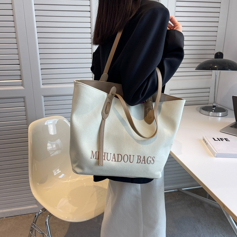 Free shipping designer High-end Canvas Bag for Women Autumn New Trendy European and American Fashion Tote Bag Large Capacity Versatile Casual Shoulder