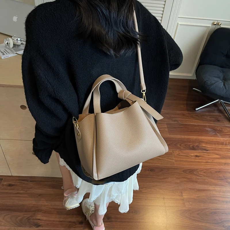 PU leather bucket bag women s shoulder bag short handle solid color simple style autumn new item lychee pattern designer bag women s crossbody bag tra