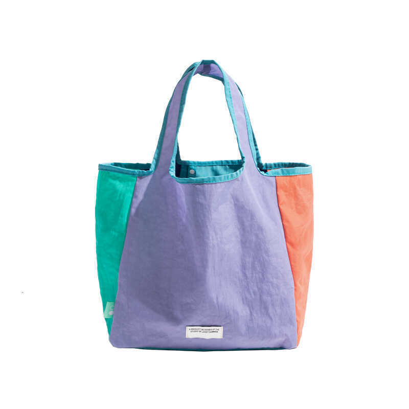 2025 designer's new color blocked foldable shoulder bag
