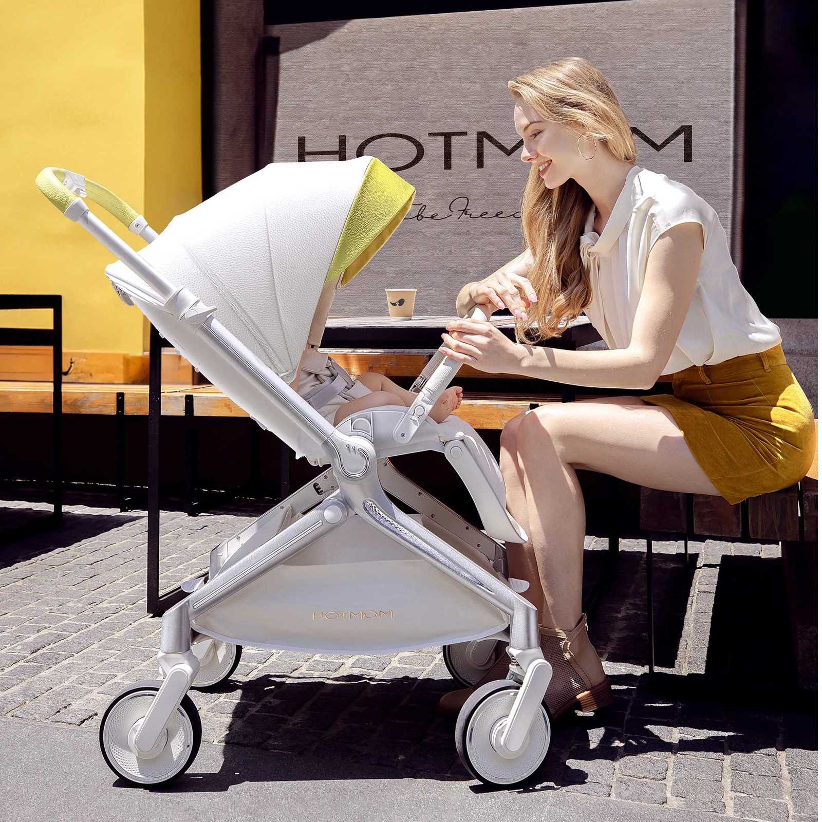 Hot Mom Evolutive Light StrollerExtra Wide SeatsReclinable BackReversibleLarge WheelsMagnesium Alloy Frame F39 W250910