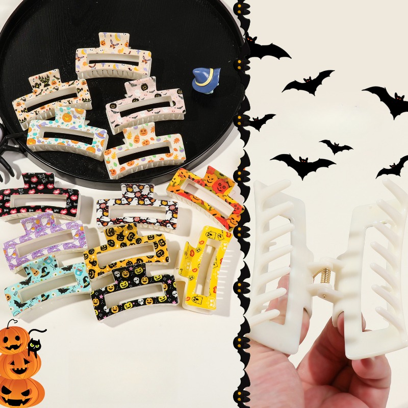 Ghoulishly Chic: Spooky Orange Skull Clips Perfect for Girl's Trick-or-Treat Outfits